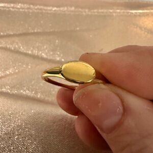 14k Gold Plated size 10 stacking ring. Comes with jewelry pouch.